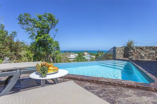 Vue terrasse - location villa Guadeloupe - Villa à ciel ouvert à Sainte Rose - 6 personnes - vue mer - Piscine privée